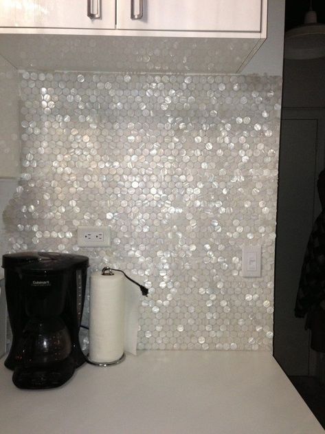 Are you looking to give your kitchen a stylish makeover? If you're searching for a way to add a bit of glamour to your kitchen, consider adding a whit... Shell Tile Backsplash, Bathroom Ceramic, Shell Tiles, Pearl Tile, Salon Ideas, Mosaic Decor, Kitchen Tiles Backsplash, Decoration Inspiration, Pearl Shell