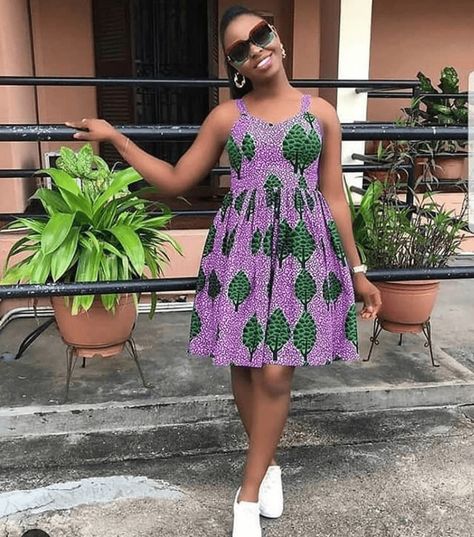 Sleeveless African Print Pleated Dress With White Sneakers | Clipkulture | Clipkulture Ankara Sundress, Ankara Short Gown Styles With Sneakers, Dress With White Sneakers, Ankara Short Gowns, Style Collab, Sneaker Ideas, Short Gown Styles, Short Ankara Dresses, Print Pleated Dress