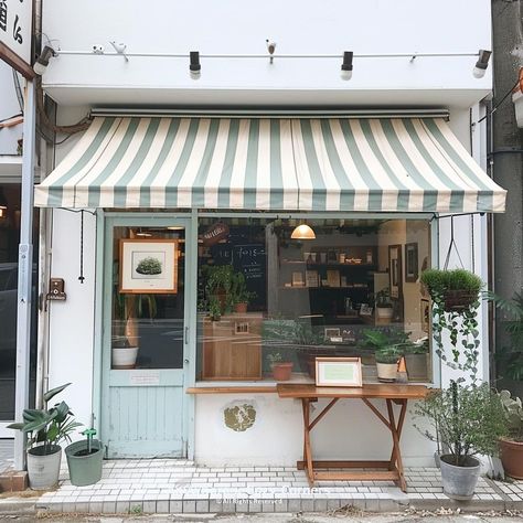 Painted Brick Store Fronts, Shop Awnings Store Fronts, Storefront Curb Appeal, Small Coffee Shop Exterior, Small Town Store Fronts, Cat Cafe Exterior, Small Cafe Shop Design, Mini Shop Ideas, Bakery Aesthetic Exterior