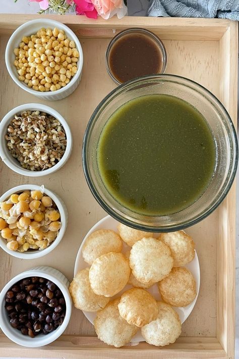 Enjoy the flavor explosion of homemade Pani Puri, a delightful Indian street food! Crispy puris filled with tangy tamarind water, spicy mint chutney, potatoes, and chickpeas for a refreshing treat. Street Indian Food, Pani Puri Water Recipes, Pani Puri Filling Recipe, Pakistani Snacks, Golgappa Recipe, Tamarind Water, Pani Puri Recipe, Mint Chutney, Puri Recipes