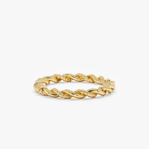 Nalani Romantic in feeling, we love the visual texture, feeling of movement, and unique twist! Add to your everyday solid gold ring stack to create a whole new vibe, or wear alone as it is just perfect. Solidly made by our goldsmiths in high polish smooth gold. - Handmade- Solid Gold- The Thickness of the Band: 2 mm All pieces come beautifully boxed in suede pouches you can always use (which really comes in handy when traveling!) Gold Twist Ring, Memory Ring, Ring Unique Design, Rope Ring, Twisted Ring, Rope Rings, Solid Gold Ring, Ring Stack, Plain Bands