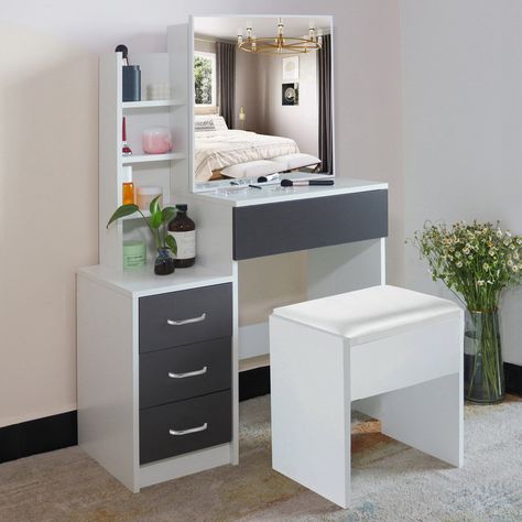 This dressing table is designed to make your daily beauty routine more convenient and efficient. The slide mirror door allows you to check your appearance from different angles, and the ample storage space keeps your beauty essentials organized and within reach. The 4 drawers offer easy access to your makeup, brushes, and accessories, making your dressing routine a breeze. The slide mirror door of this dressing table is not only stylish but also serves as a space-saving solution, as it doesn't r Storage Spaces Bedroom, White Dressing Tables, Mirror Dressing, Sliding Mirror, Next Furniture, Dressing Table Design, Accessories Making, Durable Furniture, Bedroom Vanity