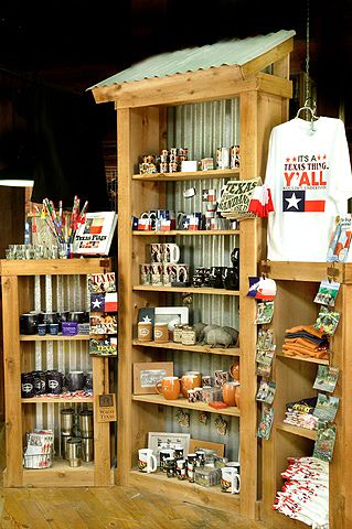 Corrugated metal & wood stands | Texas Souvenier Shop Pumpkin Store Display, Country Market Ideas, Boutique Shelving Ideas, Country Store Display Ideas, Store Display Ideas, Country Store Display, Studio Display, Gift Shop Displays, Farmers Market Display