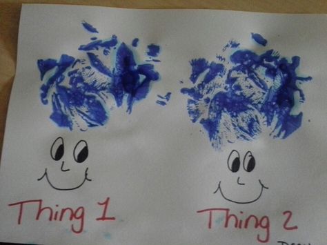 Thing 1 and thing 2 art for Dr. Seuss's birthday.  Used a bath poof dipped in blue paint for the hair, the kids loved it. (the class is 2 1/2 to 3 years old) Dr Seuss Crafts For One Year Olds, Dr Suess Crafts For Babies, Wacky Wednesday Crafts For Toddlers, Easy Dr Seuss Crafts For Toddlers, Dr Seuss Infant Art, Dr Seuss Thing 1 Thing 2 Craft, Dr Seuss Crafts For Infants, Dr Seuss Sensory For Toddlers, Dr. Seuss Crafts