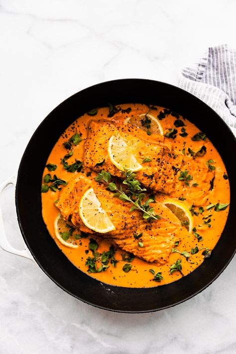 Baked salmon with Red Pepper Sauce! Baked salmon is a nutritious, delicious meal on its own, but it's even better with a dreamy, creamy roasted red pepper sauce on top! This one-pan salmon recipe is the perfect dinner to make again and again! Great for holidays, date night in, family gatherings, or any occasion! #salmon #keto #healthy #sugarfree #dinner #easyrecipe Creamy Roasted Red Pepper Sauce, Salmon Keto, Pan Salmon, Paprika Sauce, Roasted Red Pepper Sauce, Keto Healthy, Oven Baked Salmon, Frozen Salmon, Easy Grilled Chicken