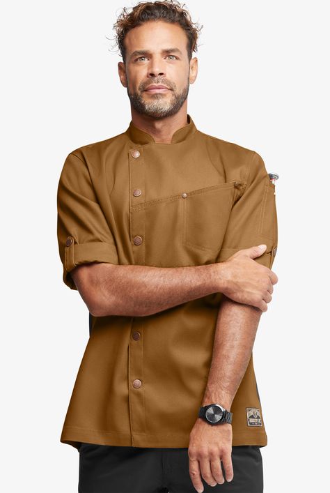 A chef coat that’s like you: truly unique. It has an asymmetrical snap front, sleeves that roll from 3/4-length to short, and back mesh panels to keep you cool. Inspired by vintage work and butcher wear, Industry Line Workwear combines the rough-and-tumble durability of canvas with an amazing sense of style. • Classic fit • Stand collar • Asymmetrical front • Snap closure • Total of 3 pockets • 1 chest pocket • 2 pen pockets on sleeve • Roll sleeves • Sleeves secure with snap tabs • Antique copp Kitchen Staff Uniform, Chef Clothing, Chef Coats, Bar Tender, Chef Uniforms, Chef Styles, Tartan Plaid Scarf, Personalized Scarves, Chef Shirts