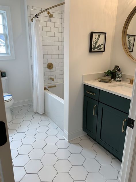 Downstairs Bathroom Remodel, Neutral Hall Bathroom Ideas, Bathroom Remodel With Hexagon Tile, Old Small Bathroom Remodel, Bathroom Remodel Honeycomb Tile, Small Bathroom Remodel Flooring, Tub And Vanity Side By Side, Bathroom Brass Accents, Guest Bath Ideas Farmhouse