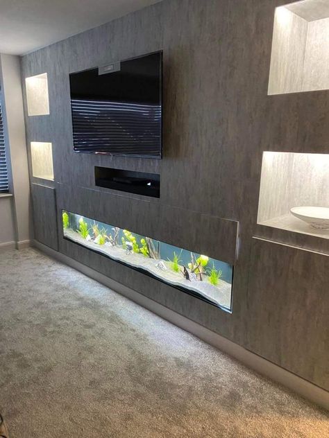 Tv Wall With Fish Tank, Fish Tank Tv Wall, Wall Mounted Fish Tank, Fish Tank Under Tv, Media Wall With Fish Tank, Living Room Fish Tank Ideas, Tv Wall Design With Aquarium, Tv Unit With Aquarium Design, Wall Aquarium Living Rooms