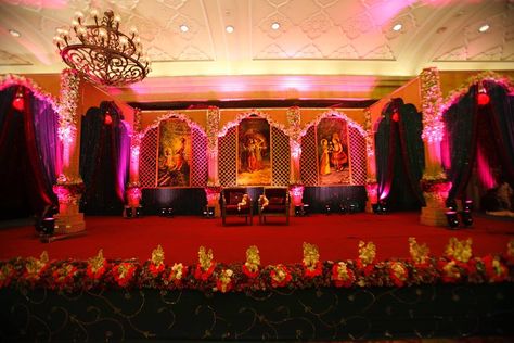 A Beautiful Wedding Stage with a theme of Radha Krishna with a royal decor style Radha Krishna Wedding Decor, Krishna Decoration Ideas, Radha Krishna Wedding, Krishna Decoration, Wedding Gifts Indian, Royal Wedding Themes, Royal Decor, Asian Wedding Decor, Stage Style