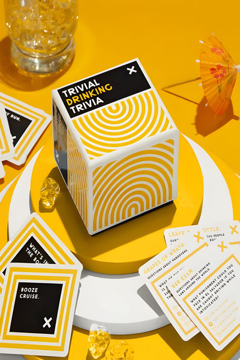 A fun and entertaining drinking trivia set with misleading categories and 200 unique questions. Includes 200 unique trivia questions to test your random drinking knowledge (to say the least). Comes with an instruction sheet that explains 3 different ways to play (depending on how smart you think you are). Explore our Pinterest Board for more ideas and in-depth details on Marmalade. #GameIdeas #HolidayPartyGames #PartyActivities #FestiveFun #BoardGames #CardGames #TriviaGames #DrinkingGames Hangover Bar, Booze Cruise, Brass Monkey, Grapes Of Wrath, Question Cards, Trivia Questions, Drinking Games, Party In A Box, Trivia Games