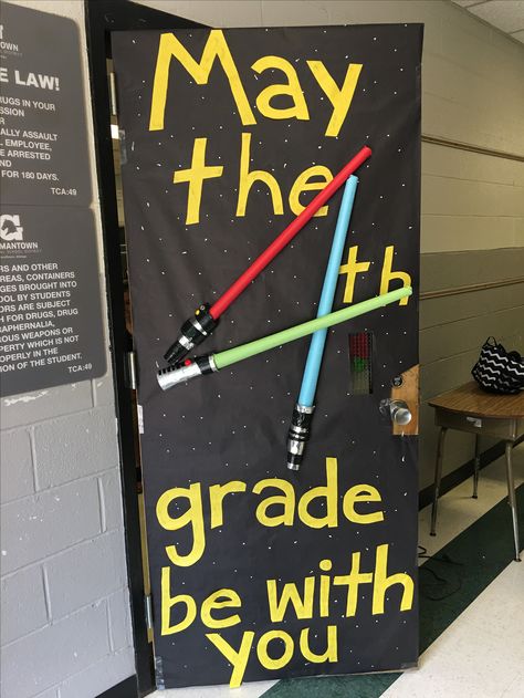 Third grade going on to fourth grade Star Wars door May the 4th Grade Be With You. Light sabers are made of cut up paper towel rolls, tape and bulletin board paper rolled up. Star Wars Classroom Door, Star Wars Door, Star Wars Classroom Theme, Decoracion Star Wars, Space Theme Classroom, Star Wars Classroom, Teacher Appreciation Doors, Space Classroom, Teacher Doors