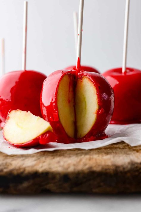 Fall is here, and that means it’s time to make a tasty batch of candy apples! Your favorite crisp apples coated in a glossy, red sugar mixture that almost looks too good to eat! Candy Apple Recipe, Red Sugar, Apple Recipe, The Recipe Critic, Recipe Critic, Caramel Corn, Fruit Jam, Gel Food Coloring, Homemade Candies