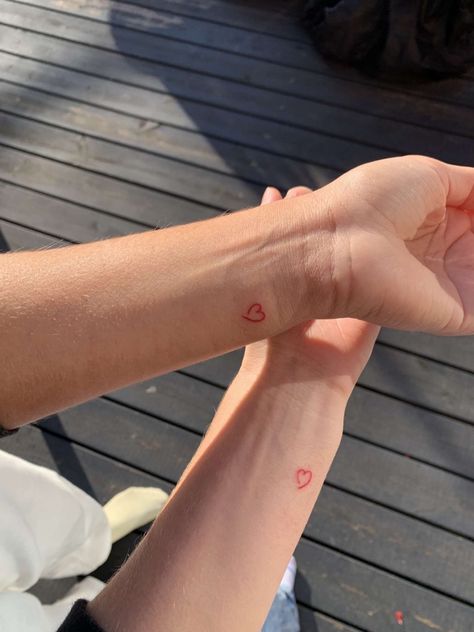 Small Red Matching Tattoos, Aesthetic Love Tattoos, Matching Hearts Tattoos, Mini Love Heart Tattoo, Mini Tattoo Best Friends, Half Heart Matching Tattoos, Love Red Tattoo, Matching Red Heart Tattoos, Red Heart Tattoo On Hand