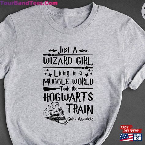 Just A Wizard Girl Living In Muggle World Took The Hogwarts Train Going Anywhere Shirt Harry Potter Unisex Hoodie Check more at https://tourbandtees.com/product/just-a-wizard-girl-living-in-muggle-world-took-the-hogwarts-train-going-anywhere-shirt-harry-potter-unisex-hoodie/ Harry Potter Shirt Ideas, Hogwarts Tshirt, Hogwarts Train, Hogwarts Shirt, Harry Potter Shirts, Movie Shirts, Ringer Tee, Latest Trend, Vacation Shirts