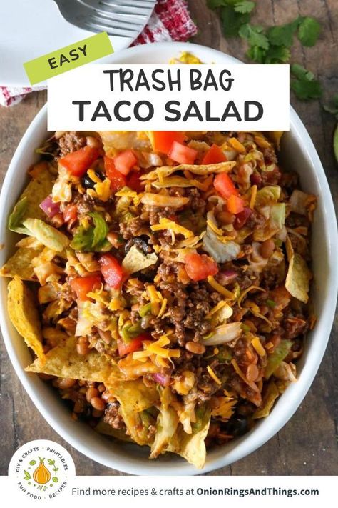 Trash Bag Taco Salad in white oblong serving bowl Tailgaiting Food, Dorito Taco Salad Recipe, Beef And Veggies, Salads For A Crowd, Taco Salads, Taco Salad Recipes, Meat Salad, Mexican Dessert Recipes, Hispanic Food