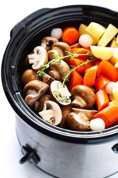 This Portobello Pot Roast recipe is easy to make in the slow cooker or pressure cooker (Instant Pot), it's full of tender potatoes, mushrooms, carrots, onions, garlic and a savory gravy, it's naturally gluten-free, vegetarian and vegan, and it's TOTALLY delicious! My kind of comfort food! | gimmesomeoven.com Portobello Pot Roast, Slow Cooker Ratatouille, Potatoes Mushrooms, Slow Cooker Vegetarian Chili, Pot Roast Recipe, Slow Cooker Vegetarian, Vegetarian Crockpot, Daniel Fast, Roast Recipe