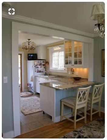 Kitchen Living Room Open Concept Small Cottage Style, Fridge Pedestal, Half Wall Between Kitchen And Living Room, 1950 Kitchen Remodel, Breakfast Peninsula, Counter Height Banquette, Open Wall Between Kitchen And Dining, Half Wall Kitchen, Small Kitchen Decoration