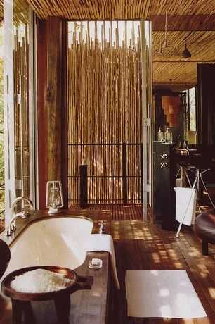 Safari Bathroom, African Interior Design, Zen Bathroom, African Interior, Bamboo Bathroom, British Colonial Style, Bamboo Wall, Vogue Living, African Decor