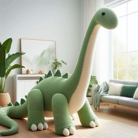 Step into a world where prehistoric creatures come to life through the art of crochet. Giant crochet dinosaurs have taken the crafting community by storm, and Dinosaur Bed, Crochet Dinosaurs, Dinosaur Puppet, Giant Crochet, Dinosaur Bedding, Dinosaur Crochet, Giant Dinosaur, Crochet Tote Pattern, Dinosaur Blanket