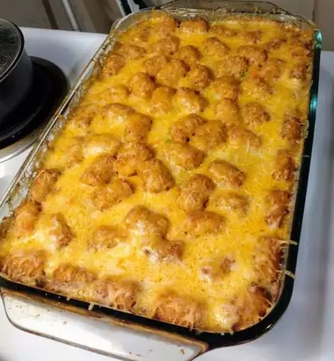 Tater Tot Casserole, also known as Tater Tot Hotdish, is a comforting and hearty meal that's perfect for a family dinner. This easy-to-make casserole combines ground beef, creamy mushroom soup, crispy tater tots, and melted Cheddar cheese into a delicious dish that's sure to please everyone at the table. Here's how to make it: Ingredients:...Read More Tater Tot Appetizers, Tater Tot Hotdish, Tater Tot Recipes, Tater Tot Casserole Recipes, Creamy Mushroom Soup, Tot Casserole, Tater Tot Casserole, Cream Of Celery Soup, Crockpot Cooking