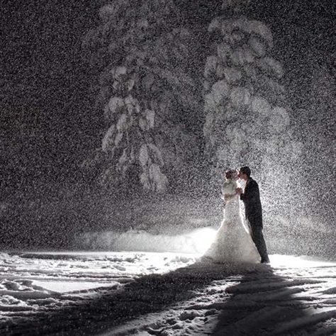 My winter wedding made TheKnot.com! As the night went on, the snow started falling heavier. Our AMAZING photographer (Ciprian Photography...he'll travel anywhere) pulled us outside and back-lit this shot with a powerful flash to get the amazing image you see. Everyone thought he did a granulated effect on the image, but this is all natural...snow. Couldn't have asked for a more memorable image for my big day and people still go on and on about it. Snowy Wedding, Winter Wedding Photos, Wedding Bridesmaids Dresses Blue, Winter Wonderland Wedding, Winter Wedding Inspiration, Destination Wedding Planning, Ideal Wedding, Wedding Advice, Wedding Pics