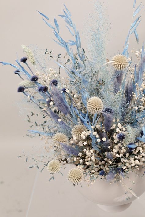 Pastel Blue Wildflowers & Scottish Globe Thistles Loose Flowers Centerpiece and Vase Arrangement / Ceremony FlowersHandmade by HiddenBotanicsOur other home/wedding decorations: https://www.etsy.com/uk/shop/HBotanicsWeddings?ref=seller-platform-mcnav&section_id=25552019Our shop: https://www.etsy.com/uk/shop/HBotanicsWeddings?ref=seller-platform-mcnav-------This beautiful handmade dried flower combination can be used in a country&barn setting or woodland boho wedding as centrepiece.Also perfect fo Wedding Cocktail Tables, Wheat Wedding, Lavender Wedding Bouquet, Blue Flower Arrangements, Bud Vases Flowers, Baby Blue Weddings, Blue Wildflowers, Flower Crown Bridesmaid, Volunteer Appreciation