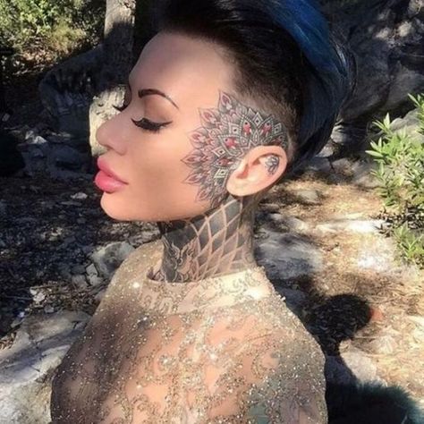 10 Tasteful Face Tattoos For Women & Their Meanings Mandala Face Tattoo, Sacred Geometric Tattoo, Tattoos Face, Hairline Tattoos, Full Neck Tattoos, Scalp Tattoo, Face Tats, Face Tattoos For Women, Throat Tattoo