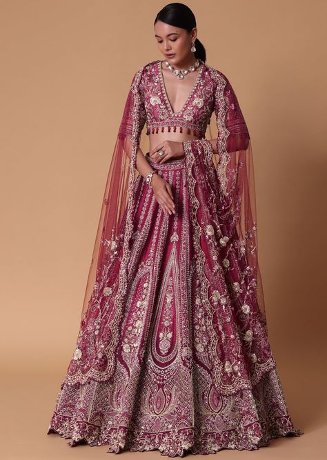 Embark on a journey of timeless elegance with our lotus motif bridal lehenga set. Crafted from a luxurious blend of red and light pink raw silk this ensemble exudes regal charm and sophistication perfect for the modern bride. Adorned with intricate lotus motifs it is completed with a stunning dori tassel back blouse. P Mauve And Red Outfit, Bridal Lehanga Blouses Modern Design, Magenta Bridal Lehenga, Modern Indian Wedding Dress, Wedding Lengha Bridal Lehenga, Indian Wedding Outfits Bridal Lehenga, Indian Bride Lehenga, Indian Wedding Lehenga Bridal, Dark Pink Lehenga