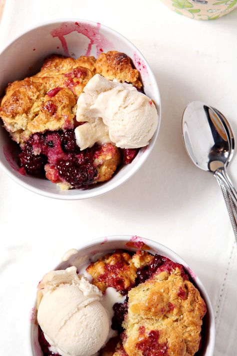 Dairy-Free Blackberry Cobbler is the ultimate summertime dessert. Blackberries are tossed in sugar and lemon zest, then roast beneath a cobbler topping. Serve with a scoop of your favorite (dairy-free) ice cream to top off this scrumptious treat. Easy Blackberry Cobbler, Blackberry Cobbler Recipe, Cobbler Topping, Berry Cobbler, Blackberry Cobbler, Dairy Free Ice Cream, Berry Juice, Dairy Free Dessert, Cobbler Recipes