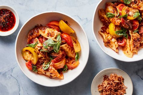 Dumpling Tomato Salad With Chile Crisp Vinaigrette Recipe - NYT Cooking Dumpling Salad, Chile Crisp, Marinated Grilled Vegetables, Chili Crisp, Vegetable Skewers, Asparagus Fries, Vegetable Noodles, Vinaigrette Recipe, Fried Shallots