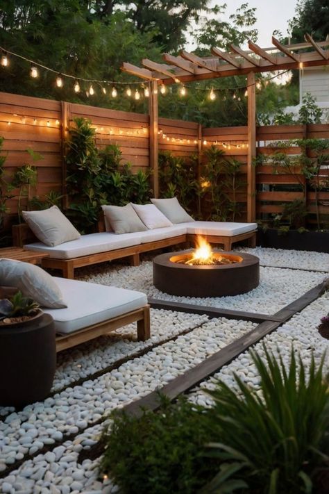 Cozy outdoor patio featuring a mini swimming pool and lush plants. All Gravel Backyard, Small Cozy Backyard Ideas, Backyard Ideas Simple, Fire Pit Ideas Backyard On A Budget, Backyard Fire Pit Ideas Lounge Areas, Backyard Lounge Area, Transitional Backyard, Townhouse Backyard, Backyard Goals