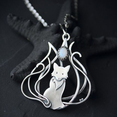 This pretty Japanese cat pendant is made of sterling silver and opal. This is a fox with nine tails - a character in Japanese mythology. These animals have great knowledge, long life, and magical abilities - perfect animal totem!
Weight - 5 g. You can buy it with the chain any convenient size or without. Made In: #Ukraine
Material: Silver #silver #pendant #catpendant #fashion #accessories #gifting #letscurate #letscurateny #letscurateusa #jewellery Kitsune Necklace, Fox With Nine Tails, Fox Charm, Shark Jewelry, Magical Abilities, Oak Leaf Necklace, Nine Tails, Silver Aesthetic, Marvel Dr