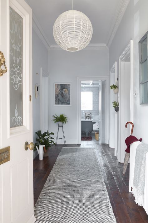 Hardwood floors look gorgeous in a hallway, but they do start to show dust and dirt around doorways quite quickly. So using a hallway rug to protect your floors from too much wear and tear makes sense. #hallway #woodflooring #realhomes Rug In Hallway, Hallway Runners Ideas Hardwood, Hallway Rugs Ideas, Hallway Runners Ideas, Hallway Colour Schemes, Dark Wooden Floor, Hallway Paint, Hallway Colours, Hall Ideas