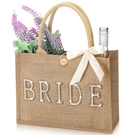 PRICES MAY VARY. Bride Bag Set: you will receive 1 piece of bride beach bag, and 1 piece of ribbon, nice combination for you to use, you can tie the ribbon on the bag, which will make your bag look more charming and delicate Proper Capacity: the plain tote bag measures about 13 x 9.5 x 4.7 inches/ 33 x 24 x 12 cm, proper size for you to store items, such as purses, notebooks, pens, jewelry, cosmetics, and more, please check about the size information before purchase Sturdy and Reusable: our brid