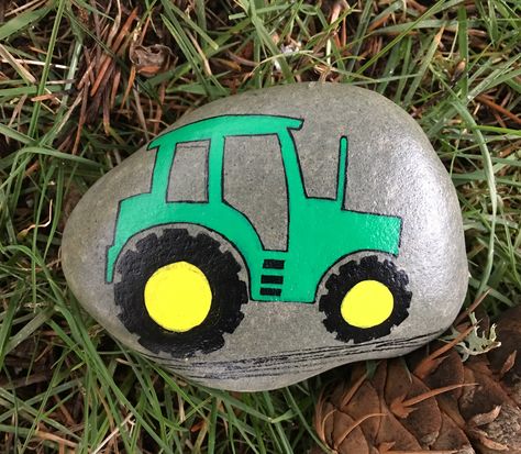 Green tractor painted rock Tractor Painted Rocks, Truck Rock Painting, Fancy Napkin Folding, Christmas Pebble Art, Ladybug Rocks, Rock Painting Tutorial, Happy Stones, Painted Rocks Kids, Painted Rocks Craft