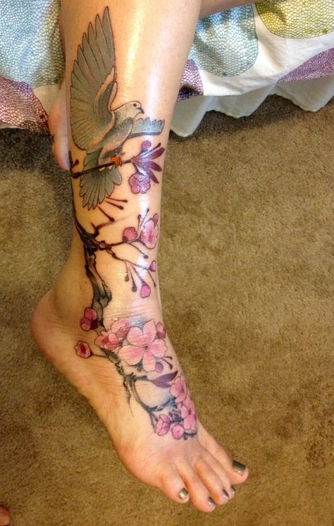 Cherry blossom dove tattoo Cherry Blossom Tattoo On Leg, Dove Leg Tattoo, Cherry Blossom Foot Tattoo, Cherry Blossom Leg Tattoo, Ankle Lower Leg Tattoos, Dove Tattoo Design For Women, Cherry Blossom Tattoo Sleeve, Dove Tattoo Design, Lower Leg Tattoos