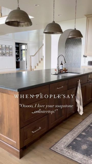 Dark Wood Cabinets With Black Countertop, Soapstone Granite Countertop, Black Diamond Quartzite Kitchen, Black Diamond Quartzite Honed, Black Island Brown Cabinets, Honed Soapstone Countertops, Double Ogee Edge Countertops, Soapstone Looking Quartz, Black Diamond Quartzite