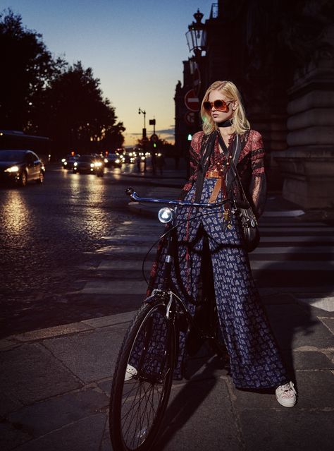 Silk and lace dress, price on request, cotton bra top, $440, printed pants, $1,280, all, ETRO, collection at Saks Fifth Avenue stores nationwide. Sunglasses, WILDFOX SUN, $189. Gold-plated brass earrings, AURÉLIE BIDERMANN, $555. Silk scarf, ROCKINS LONDON, $200. Rope, wood, and brass necklace, CHLOÉ, $690. Leather belt, DRIES VAN NOTEN, price on request. Calfskin handbag, COACH, $695. Embellished printed canvas sneakers, MARC JACOBS, $395. Carbon fiber bicycle, HERMÈS, price on request. ... Urban Editorial, David Burton, Bike Fashion, Bicycle Chic, Elle Us, Alfred Stieglitz, Cycle Chic, Couture Looks, Spring Couture