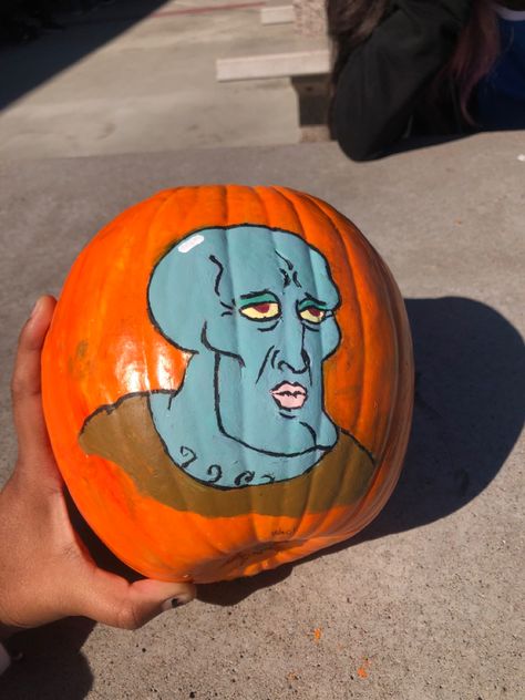 #squidward #pumpkin #halloween #handsomequidward #spongebob #cool #asthetic Gravity Falls Pumpkin Painting, Handsome Squidward Pumpkin, Spongebob Pumpkin Painting, Squidward Pumpkin, Spongebob Cool, Spongebob Pumpkin, Squidward Painting, Spongebob Halloween, Creative Pumpkin Painting