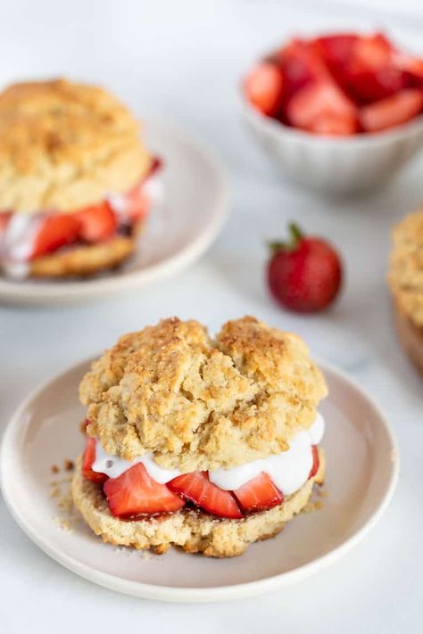 This AMAZING Gluten-Free Vegan Strawberry Shortcake is the ultimate summer dessert! With a fluffy homemade biscuit, fresh strawberries and topped with coconut whipped cream! The best recipe that uses simple, healthy ingredients and couldn't be easier to make! Vegan Strawberry Shortcake, Strawberry Shortcake Recipe, Healthy Summer Desserts, Gluten Free Biscuits, Simply Quinoa, Strawberry Shortcake Recipes, Shortcake Recipe, Buttery Biscuits, Coconut Whipped Cream