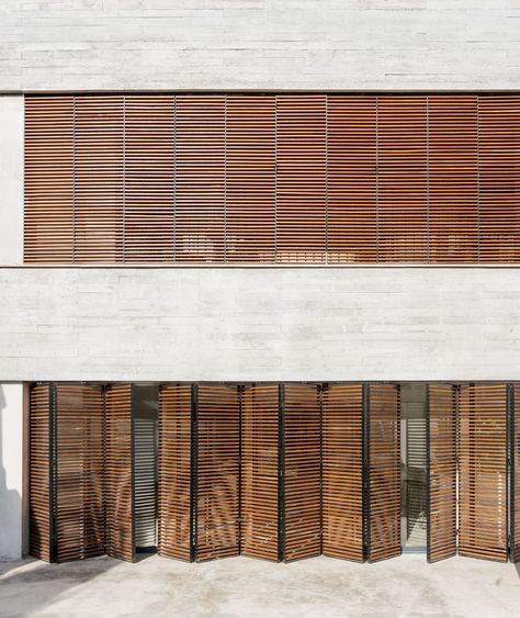 Large wooden shutters filter light and air into Mallorcan home by Company Studio Blind Inspiration, Blinds Inspiration, Wooden Window Shutters, Stepping Stone Walkways, Spanish Practice, House Shutters, South Facing Garden, Canopy Shelter, Oak Wood Floors