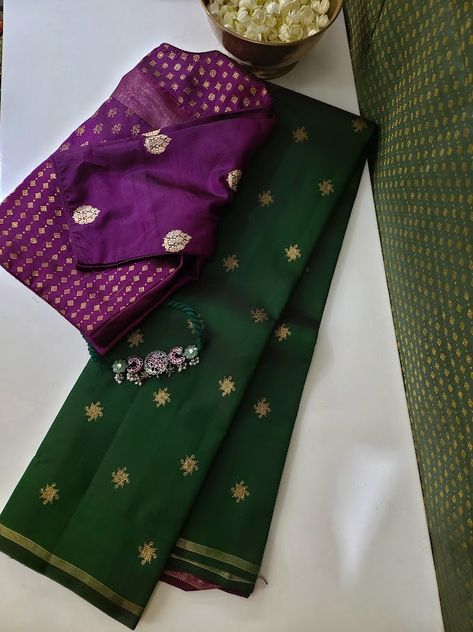 Dark green kancheepuram silk saree completely handwoven with pure zari motifs on the saree, and a deep violet pallu in contrast. The blouse is plain violet silk Plain Dark Green Saree Contrast Blouse, Contrast Blouse For Purple Silk Saree, Contrast Blouses For Silk Sarees, Dark Green Saree Contrast Blouse, Green Saree Contrast Blouse, Dark Green Saree, Saree Contrast Blouse, Green Kanchipuram Silk Saree, Kancheepuram Silk Saree