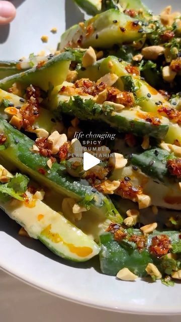 236K views · 7.5K likes | Mediterranean Diet Plan 🇺🇸 on Instagram: "🥒🥜 Changing how you eat cucumbers & let me tell you it’s definitely life-changing 🔥SPICY CUCUMBER PEANUT-TAHINI SALAD All the crunch but dosed in this incredibly yummy sauce then topped with roasted peanuts & chili onion crunch. This will be your go-to for a summer bbq, picnic or paired with your favorite protein. It also keeps well in the fridge so you can eat from it whenever you want. Cre by @cherylshealthylife  Spicy cucumber peanut tahini salad 6 Persian cucumbers 1/2 tsp kosher salt 1/3 cup roasted salted peanuts Handful of cilantro leaves chopped 2 tbsp natural unsalted peanut butter 2 tbsp tahini 2 tbsp coconut aminos 1 tbsp rice vinegar 1 tsp maple syrup 1 garlic clove grated *1 tbsp of water if necessary to Chili Onion Crunch, Tahini Salad, Spicy Cucumber, Salted Peanuts, Bbq Picnic, Coconut Aminos, Mediterranean Diet Plan, Persian Cucumber, Garlic Clove