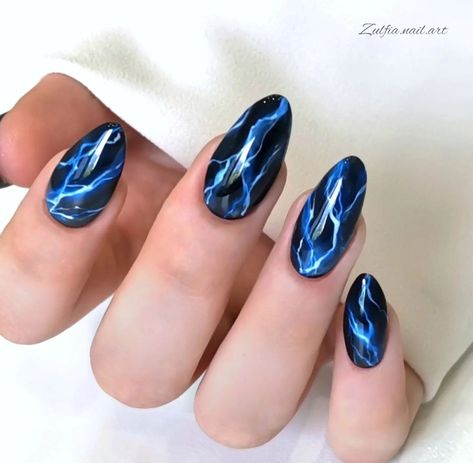 Nail arts/nail polish/blue Nails Ideas August 2024, Small Blue Nails, Nightwing Nails, Tron Nails, Blue Lightning Nails, Storm Nails, Lightning Nails, Men Nails, Fake Nails Designs