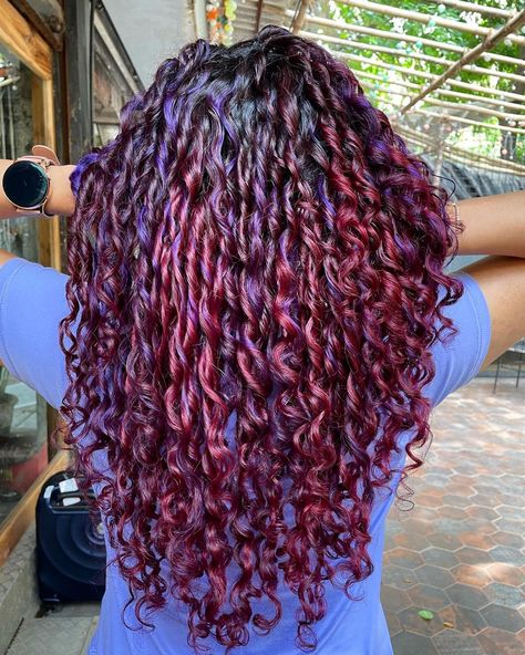 Curly Hair Highlights Chunky Red Highlights Curly Hair, Curly Hair Red Highlights, Curly Purple Highlights, Vivid Color On Curly Hair, Magenta Highlights Curly Hair, Red Highlights On Dark Hair Curly, Red Violet Curly Hair, Blonde Highlights Curly Hair, Really Curly Hair