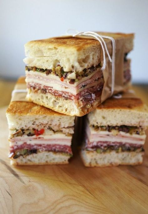 14 Fancy Sandwich Recipes That Are Worthy of the Dinner Table via Brit + Co Muffaletta Recipe, Muffaletta Sandwich, Picnic Sandwiches, Think Food, Best Sandwich, Snacks Für Party, Chapati, Soup And Sandwich, Wrap Sandwiches