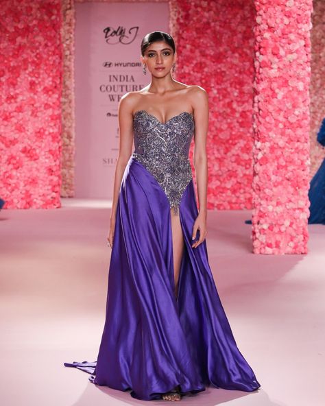 "Violette" Cocktail Gown Deep Lilac Satin gown accentuated with hand beaded and crystal encrusted bodice. Available at Delhi and Mumbai Store. Jewellery Partner: @shailjas_naturaldiamonds Shoe Partner: @venussteps Gift Partner: @smokelabofficial Celebration Partner: @cedarclubhouse Photography : @gesuseth @hyundaiindia @reliancebrandsitd @lotus_herbals #FDCI #HyundailndiaCoutureWeek #ICW2024 #Hyundai #RelianceBrandsLtd #MakingOfTheCollections #DollyJ Dolly J Gowns, Dolly J, Drape Sarees, Satin Embroidery, Crystal Embroidery, Gown For Women, Gown Pattern, Embroidered Bodice, Cocktail Gowns