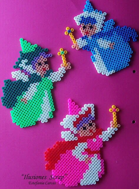 Flora, Fauna, and Merriweather perler beads Three Fairies, Hama Beads Disney, Perler Beads Ideas, My Hobbies, Fuse Bead Patterns, Fusion Beads, Hama Beads Design, Diy Perler Bead Crafts, Perler Crafts