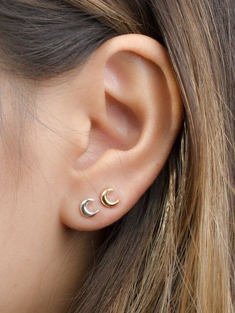 These tiny moon earrings are the perfect addition to your minimalist earring collection. Our moon stud earrings are meant to be classic enough for everyday wear or to give as a bridesmaid gift. These delicate earrings will definitely be a favorite of yours! At LunaiJewelry, we take pride in the Second Hole Earrings, Ruby Earrings Studs, Multiple Earrings, Mini Earrings, Moon Studs, Tiny Star, Tiny Earrings, Celestial Jewelry, Moon Jewelry