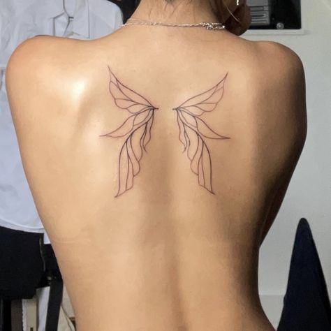 Fairy Wings Back Tattoo Aesthetic, Mini Fairy Wings Tattoo, Tiny Wings Tattoo On Back, Fair Wing Tattoo, Tattoo Upper Back Women, Simple Fairy Wings Tattoo, Fairy Wing Ear Tattoo, Spine Tattoos With Wings, Fae Wings Tattoo